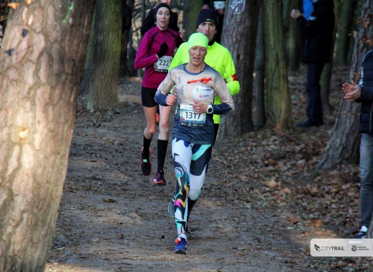 Zdjęcie zapraszające do Olsztyna na kolejną edycję Biegu – City Trail Olsztyn. 