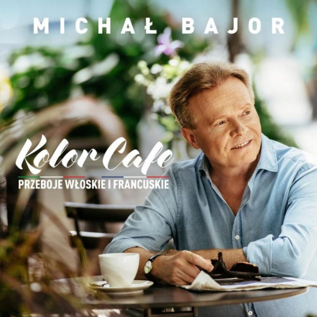 Plakat graficzny zapraszający na koncert Michała Bajora "Kolor Cafe". 