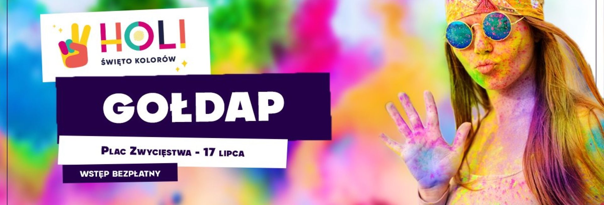 Plakat graficzny zapraszający do Gołdapi na imprezę Holi Święto Kolorów – Gołdap 2021. Na plakacie dziewczyna podczas imprezy pobrudzona różnymi kolorami.   