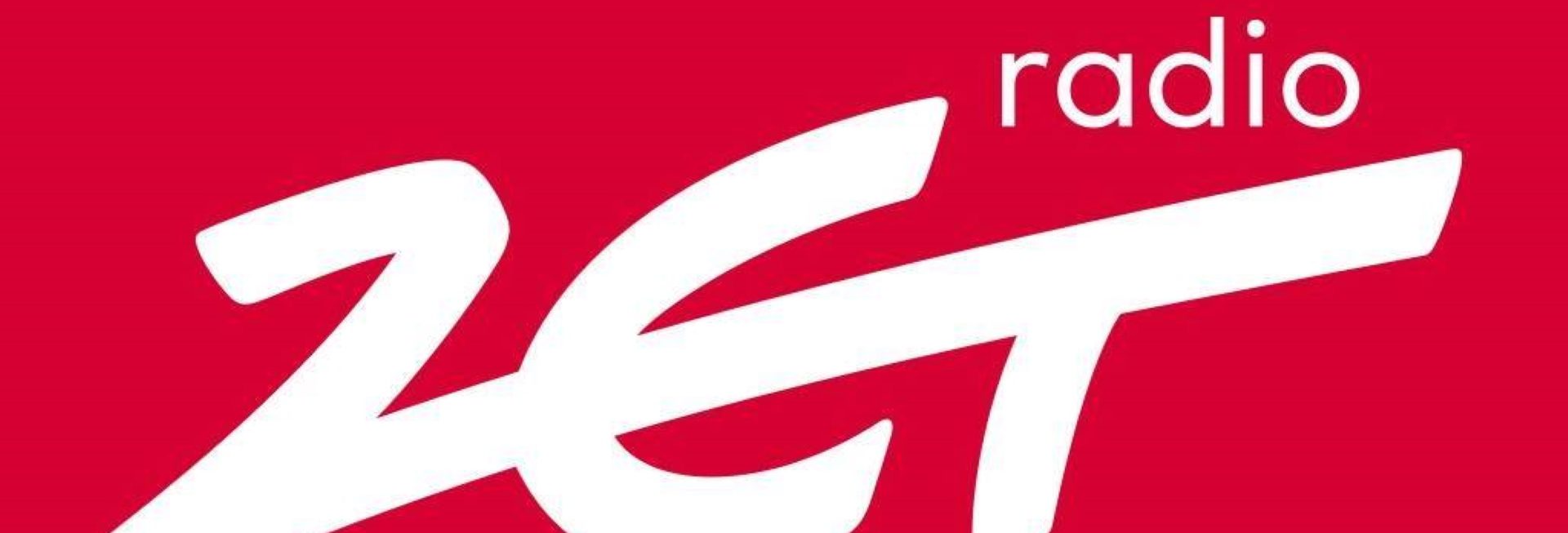 Logo Radia Zet. Napis na biało Radio Zet na czerwonym tle. 