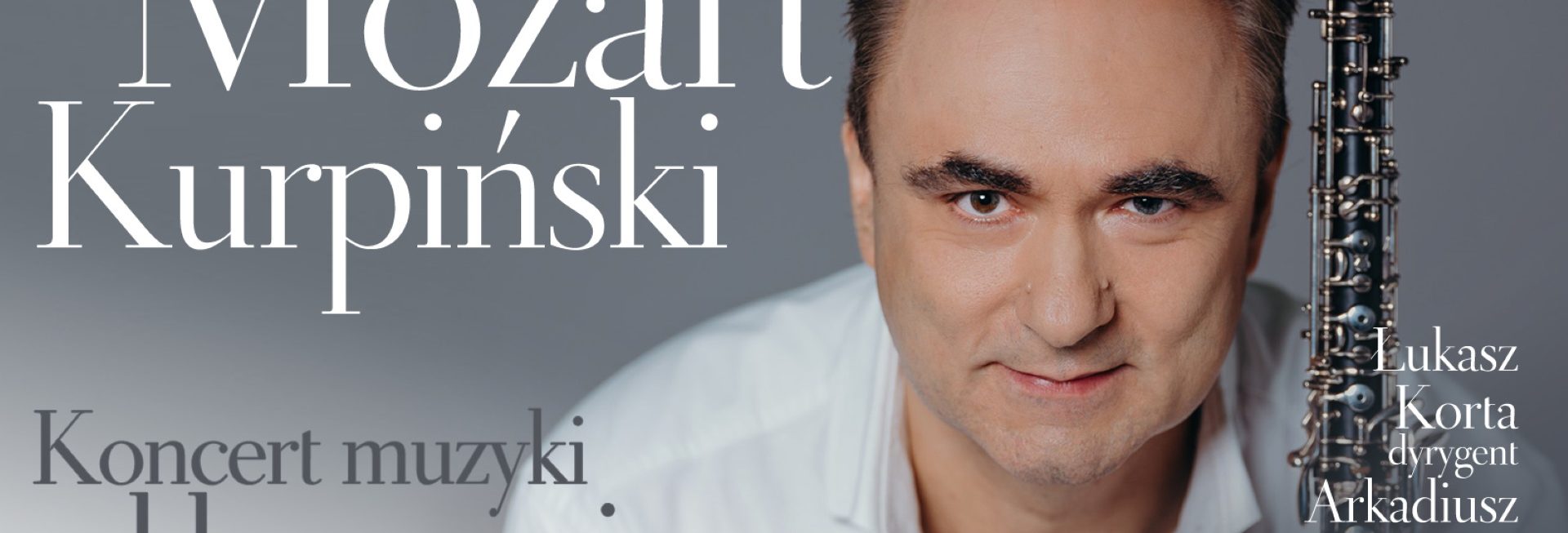 Plakat zapraszający do Olsztyna na koncert muzyki klasycznej Mozart i Kurpiński - Filharmonia Olsztyn 2022.
