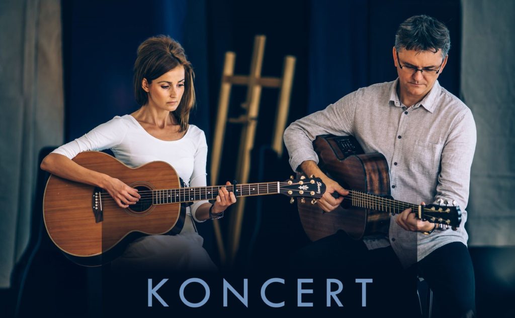 Plakat zapraszający do Centrum Kulturalno-Biblioteczne w Gietrzwałdzie na koncert Andrzeja Koryckiego i Dominiki Żukowskiej Gietrzwałd 2023.