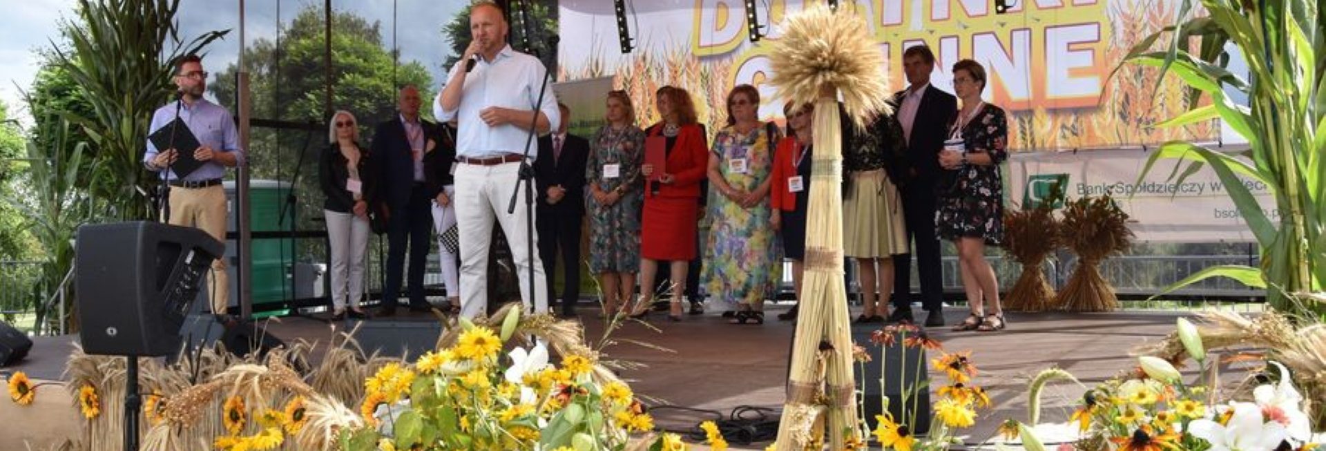 Zdjęcie zapraszające do Gołdapi na cykliczną imprezę Dożynki Gminne Gołdap 2023. 