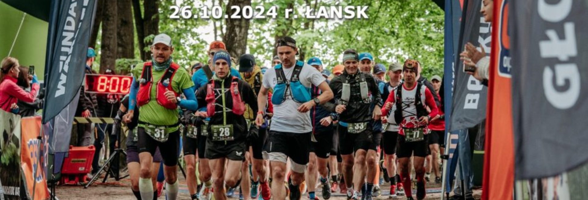 Plakat zapraszający w sobotę 26 października 2024 r. na 5. edycję Jesiennego Ultramaratonu Warmińskiego "Warneland" Łańsk 2024.