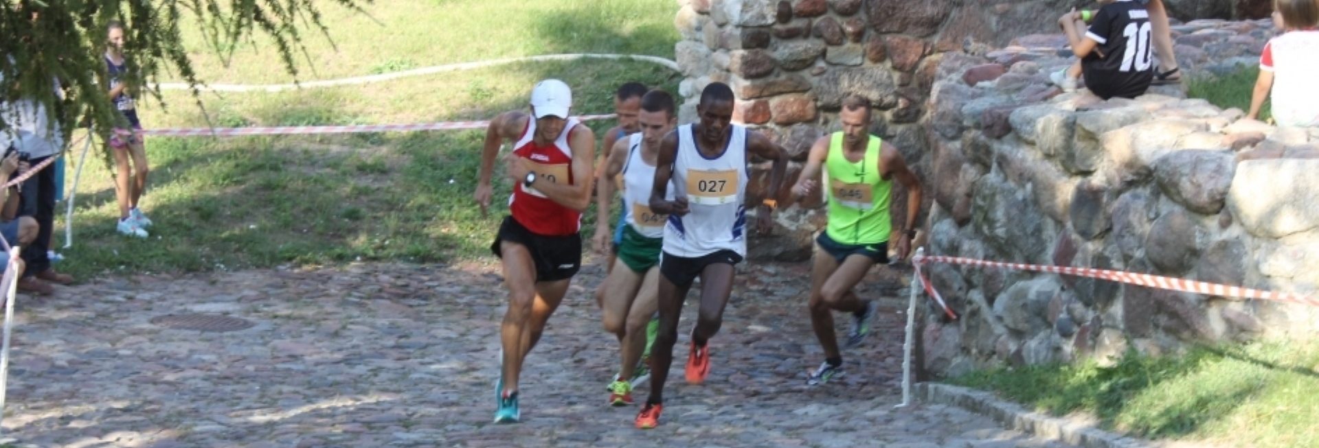 Zdjęcie zapraszające na kolejną edycję Biegu "Wokół Pasłęckich Murów Obronnych" Pasłęk.