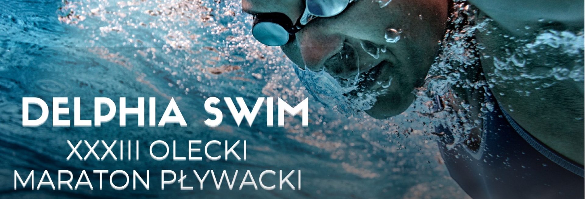 Plakat zapraszający w sobotę 26 lipca 2025 r. do Olecka na 33. edycję Delphia Swim Olecki Maraton Pływacki Olecko 2025.