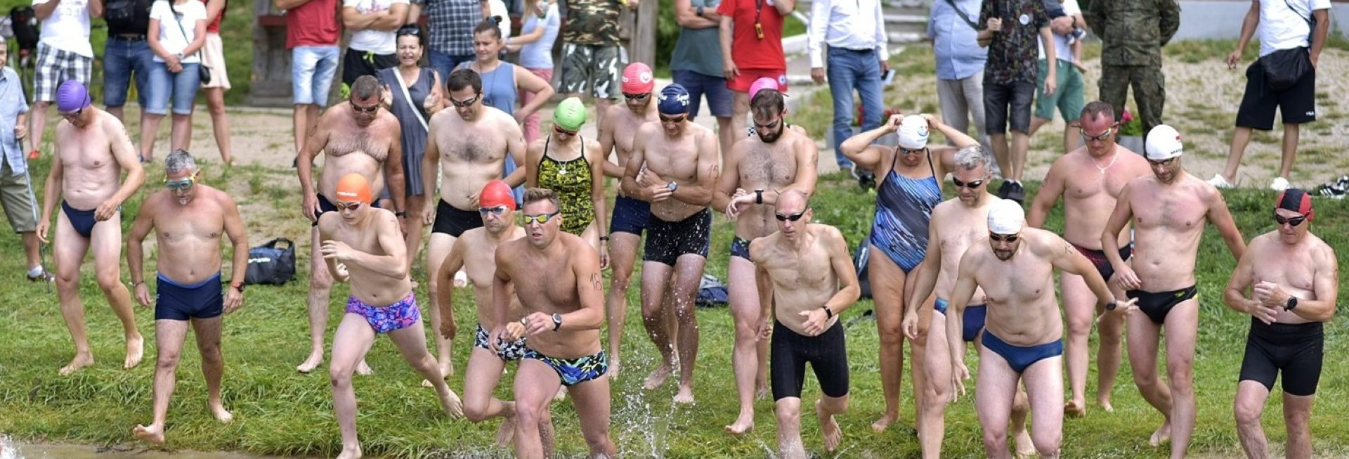Zdjęcie zapraszające do Mrągowa na Maraton Pływacki o Puchar Burmistrza Miasta Mrągowo 2025.