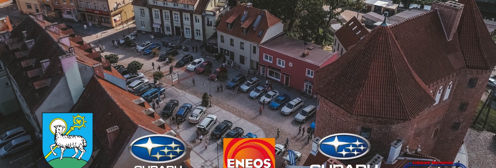 Plakat zapraszający do Lidzbarka Warmińskiego na coroczny Zlot Subaru Lidzbark Warmińskim.