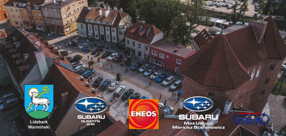 Plakat zapraszający do Lidzbarka Warmińskiego na coroczny Zlot Subaru Lidzbark Warmińskim.   