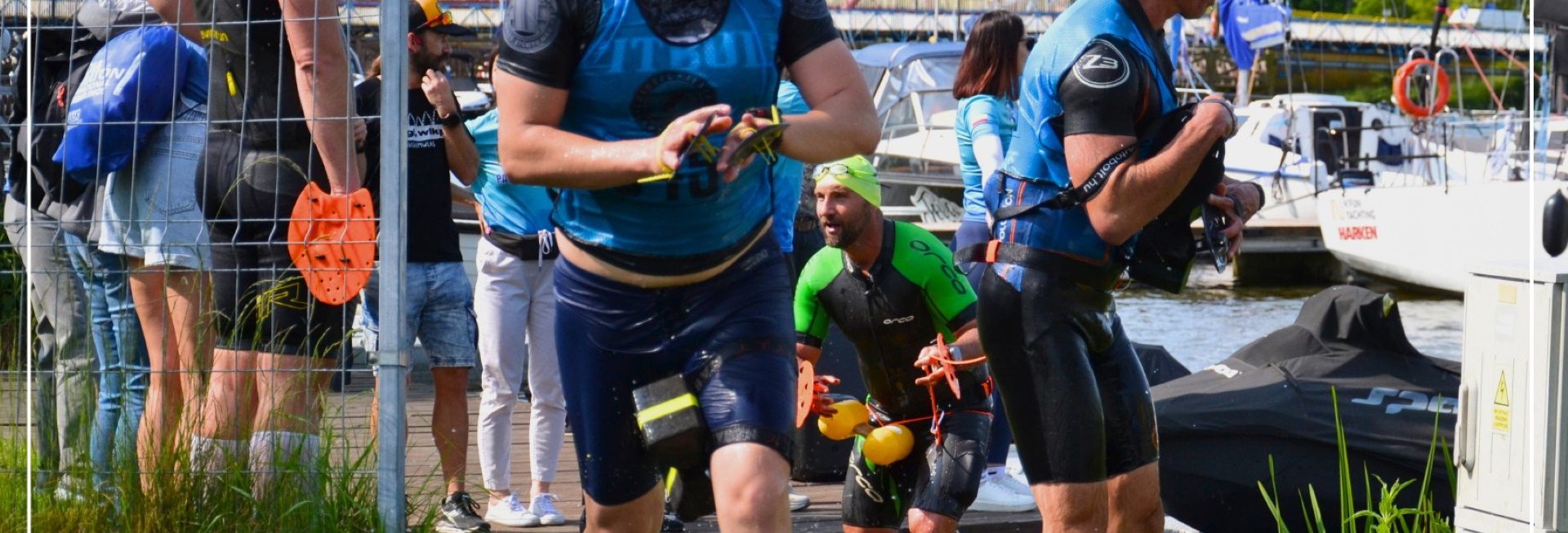 Zdjęcie zapraszające do Iławy na kolejną edycję zawodów SwimRun Kono Iława 2026. 