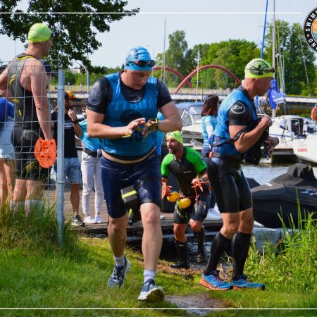 Zdjęcie zapraszające do Iławy na kolejną edycję zawodów SwimRun Kono Iława 2026. 