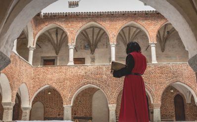 Plakat zapraszający w czwartek 19 lutego 2026 r. do Lidzbarka Warmińskiego na Dzień Mikołaja Kopernika Lidzbark Warmiński 2026.